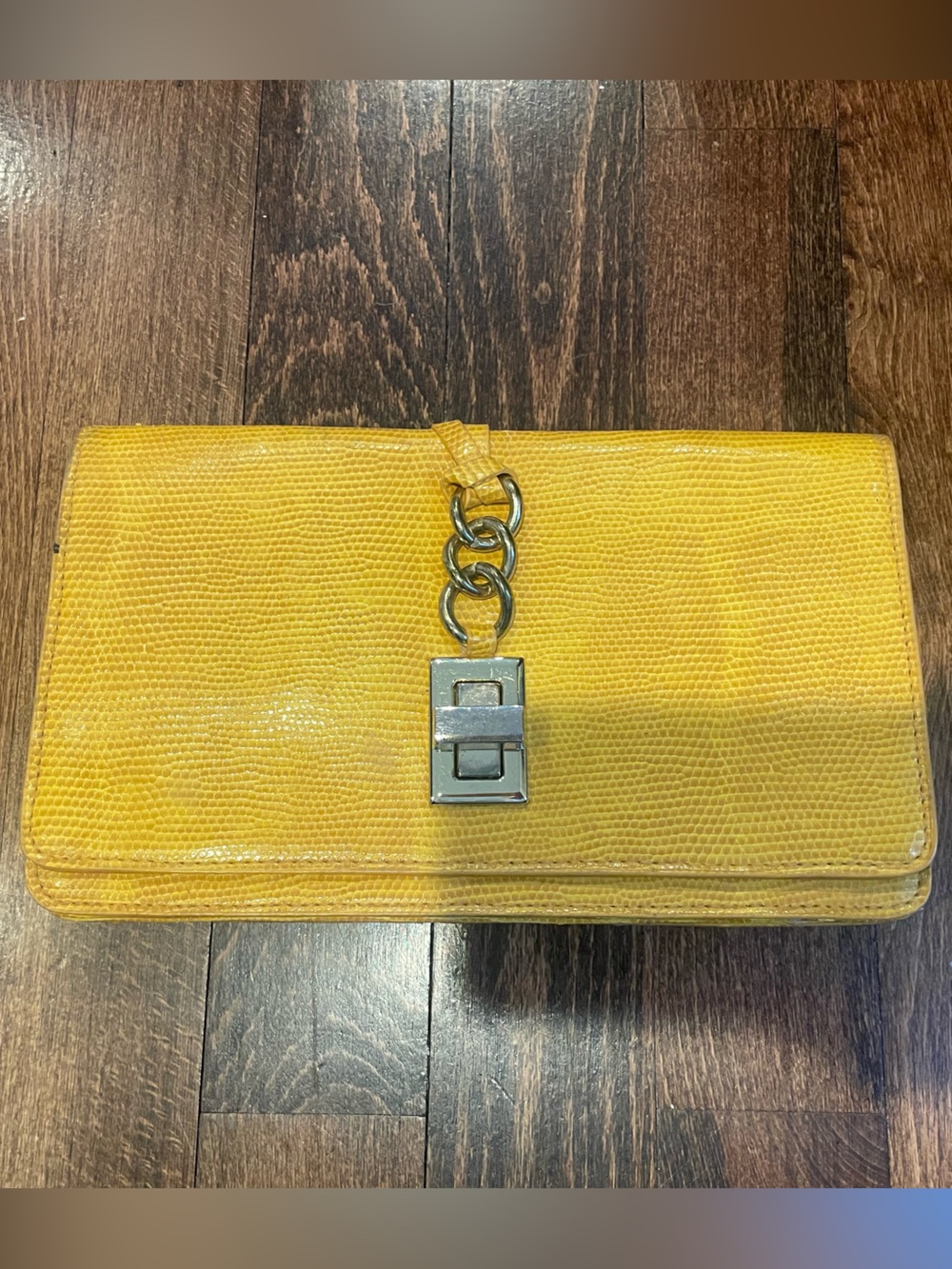 Mustard yellow clutch with gold hardware